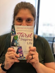 Happy author with a book